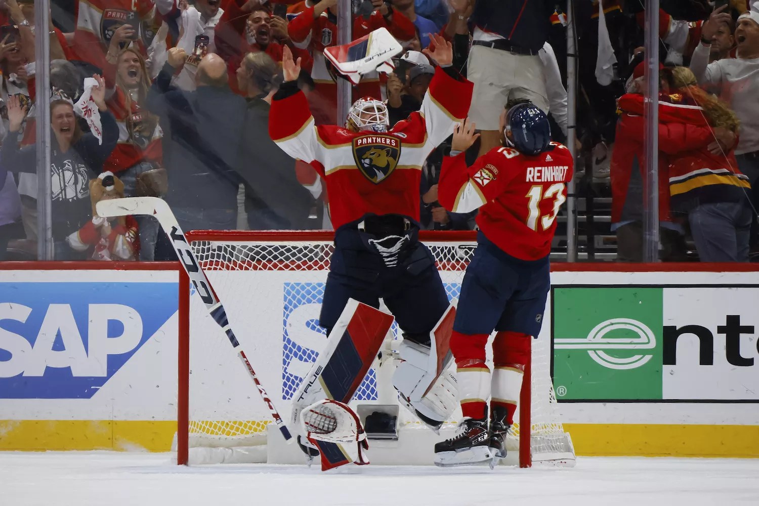 Sergei Bobrovsky #72 and Sam Reinhart #13 of the Florida Panthers celebrate after their 2-1 victory against the Edmonton Oilers in Game Seven of the 2024 Stanley Cup Final at Amerant Bank Arena on June 24, 2024 in Sunrise, Florida